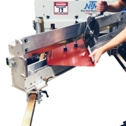 Technician slits a metal panel using the angle slitter attachment