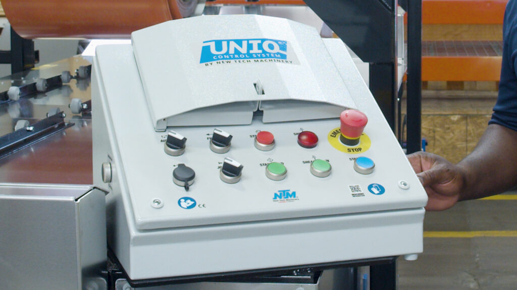 The UNIQ® automatic control system is mounted on an SSQ II™ MultiPro roof panel machine
