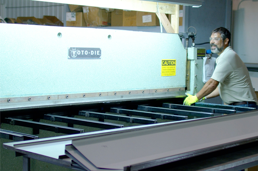 someone operating a press brake machine