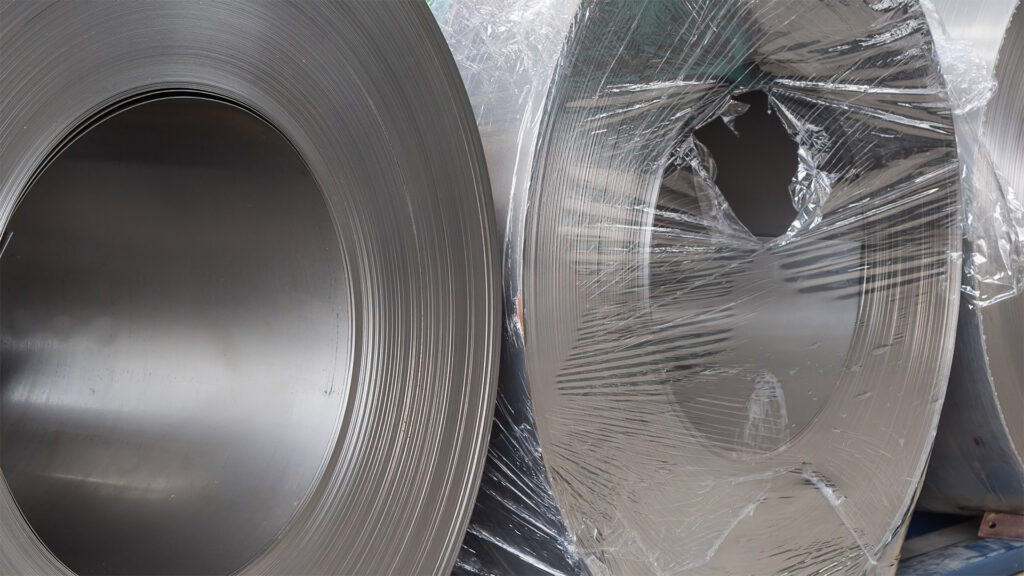 Mill finish metal coil wrapped in protective plastic