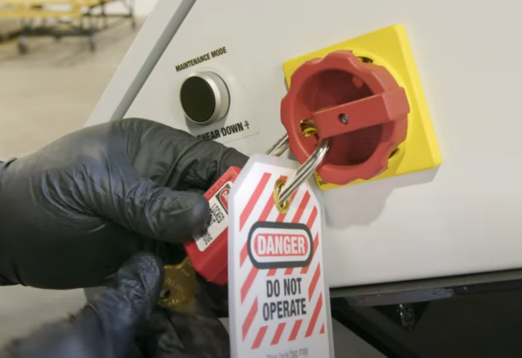Performing lockout tagout on machine