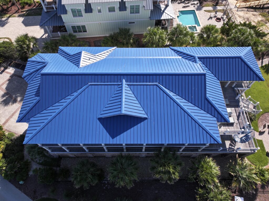 condo building with a blue metal roof