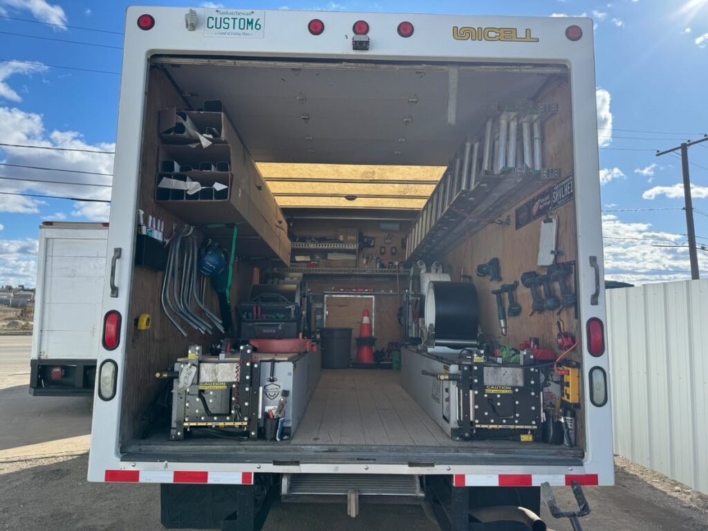 Two gutter machines in a truck