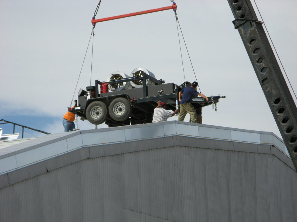 Machine lifted onto roof